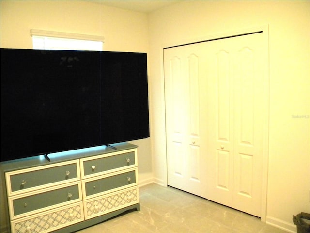 unfurnished bedroom with a closet