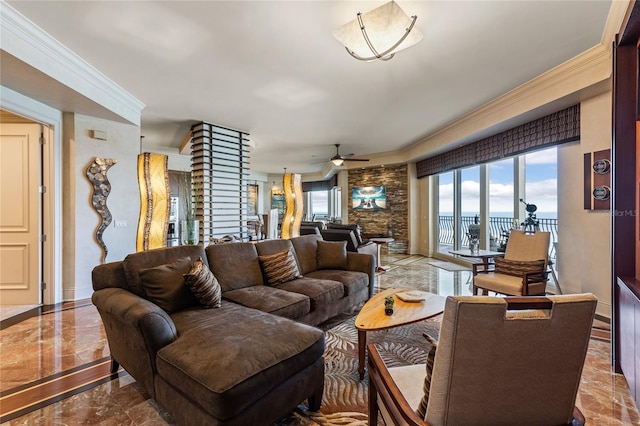 living room featuring ceiling fan and crown molding