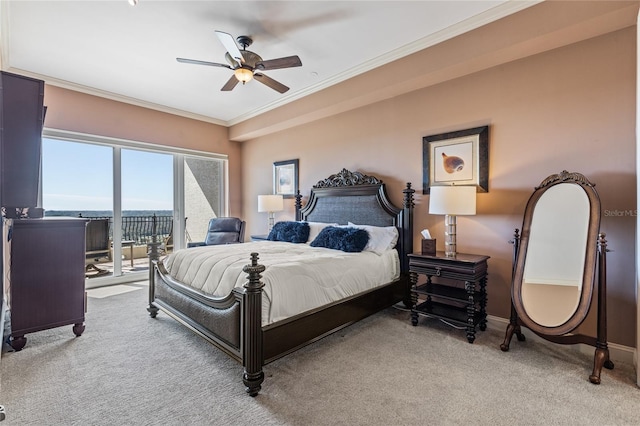 carpeted bedroom with access to outside, ceiling fan, and crown molding