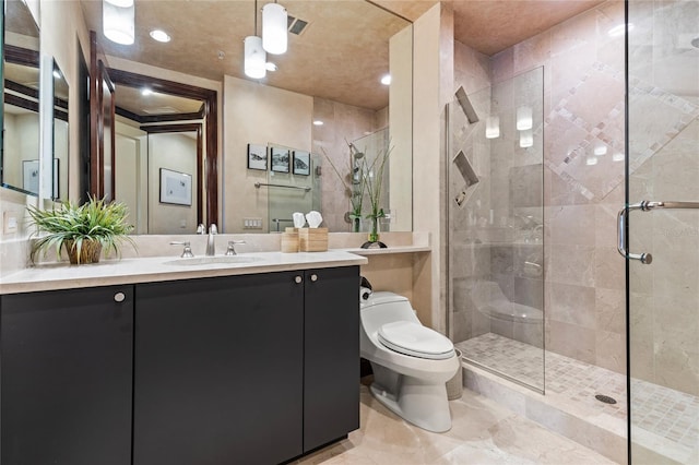 bathroom featuring vanity, toilet, and an enclosed shower