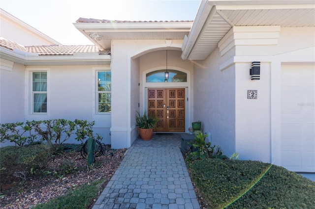 property entrance featuring a garage