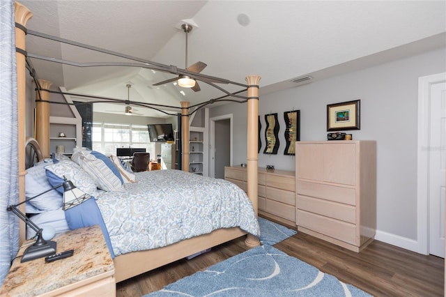 bedroom with ceiling fan, dark hardwood / wood-style flooring, and lofted ceiling