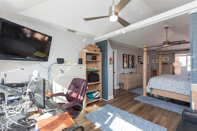 bedroom with ceiling fan, dark hardwood / wood-style flooring, and lofted ceiling