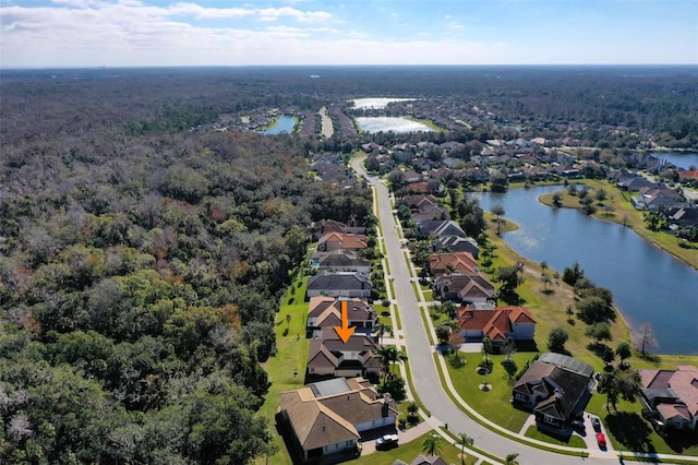 bird's eye view with a water view