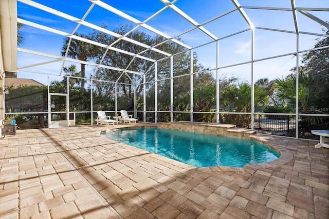 view of pool featuring a lanai and a patio