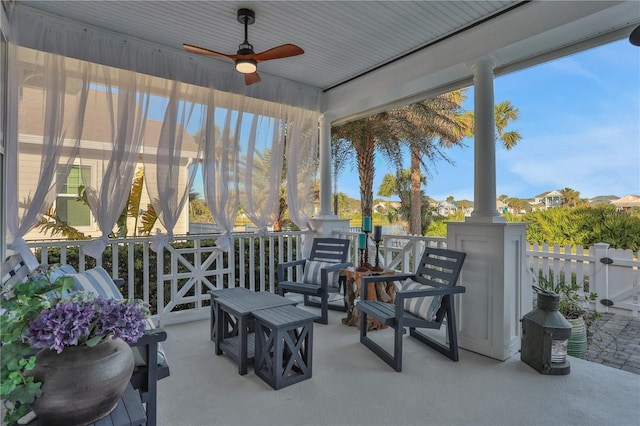 view of patio featuring ceiling fan