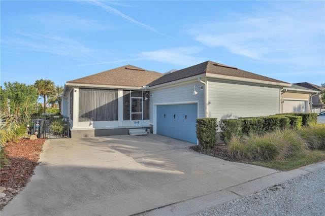 view of front of property with a garage