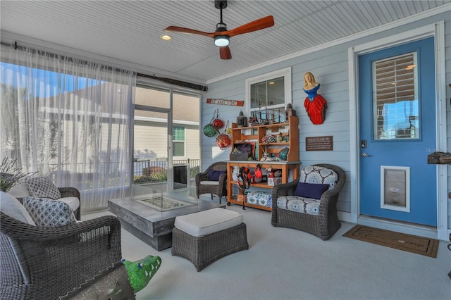 sunroom / solarium with ceiling fan