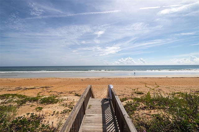 view of water feature with a beach view