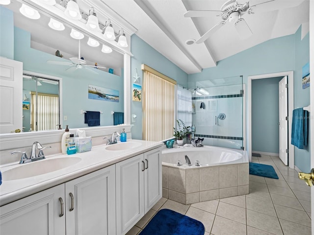 bathroom with tile patterned flooring, vanity, vaulted ceiling, and independent shower and bath