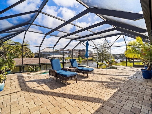 view of patio / terrace with a lanai