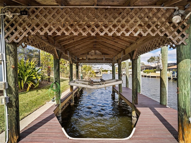 dock area with a water view