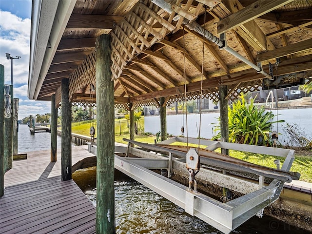 dock area with a water view