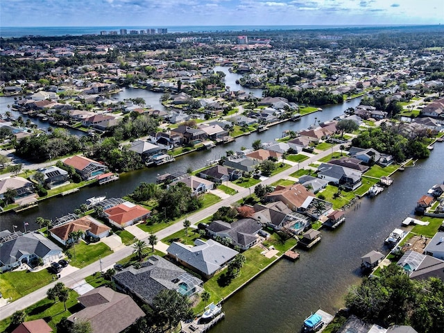 bird's eye view with a water view