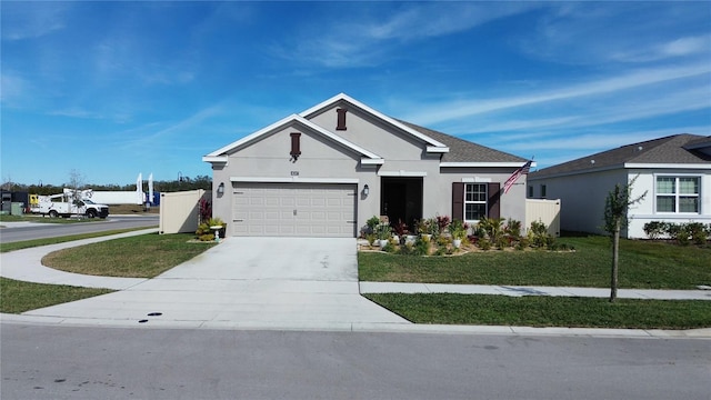 view of front of house with a garage and a front lawn