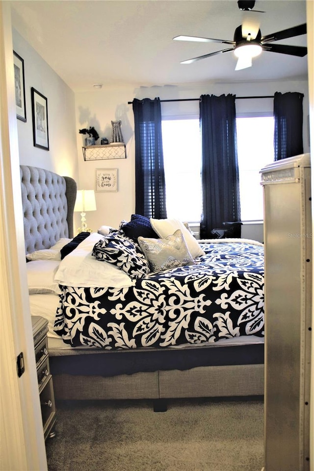 bedroom featuring carpet and ceiling fan