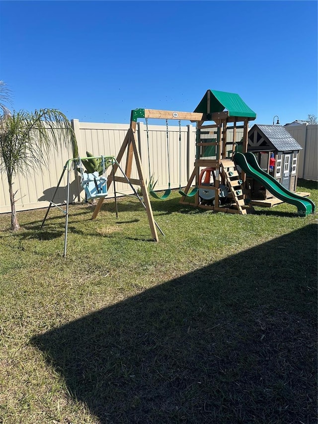 view of play area with a yard