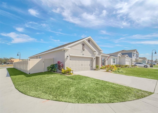 ranch-style house with a garage and a front lawn