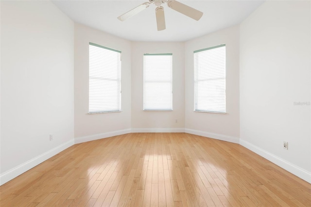 unfurnished room with a wealth of natural light and light wood-type flooring