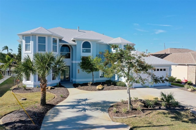 view of front of house with a garage