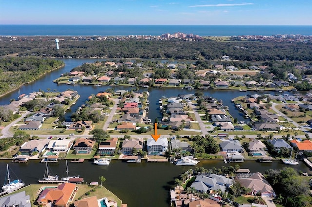 bird's eye view with a water view