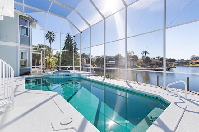 view of swimming pool featuring a lanai, a water view, an in ground hot tub, and a patio