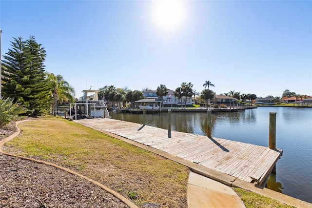 dock area featuring a water view