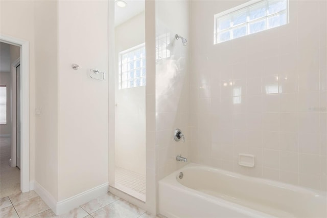 bathroom with tile patterned floors