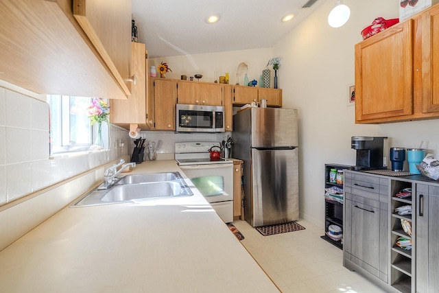 kitchen featuring sink and appliances with stainless steel finishes