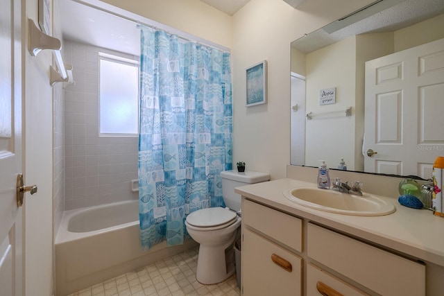 full bathroom featuring shower / bath combo, toilet, and vanity