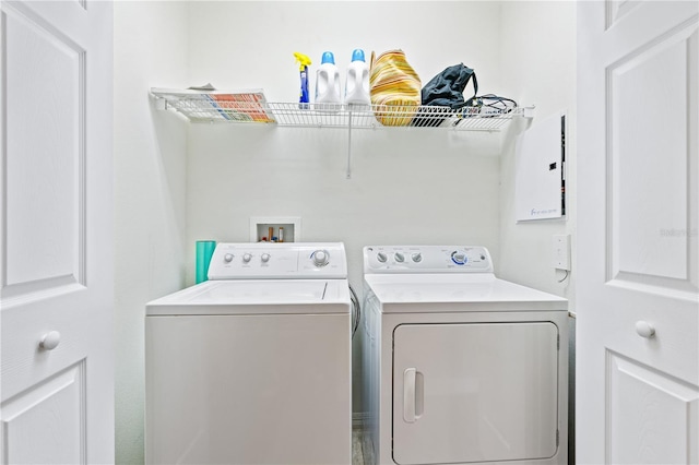 laundry room featuring washer and clothes dryer