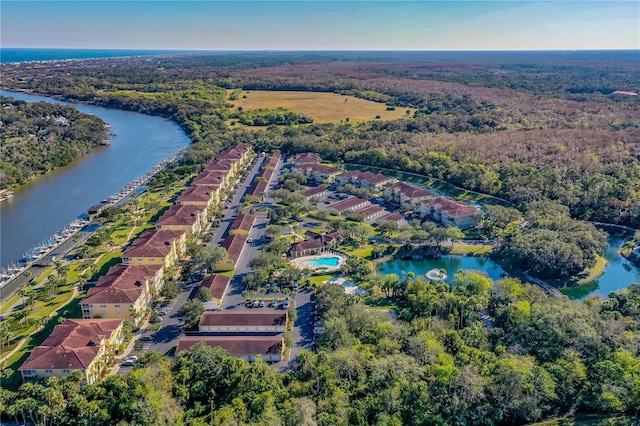 drone / aerial view with a water view