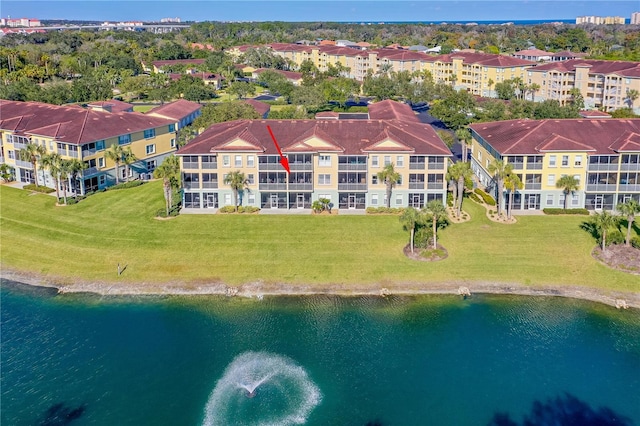 bird's eye view with a water view