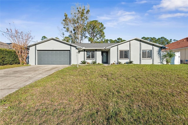 ranch-style home with a garage and a front lawn