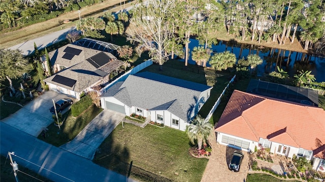 drone / aerial view with a water view