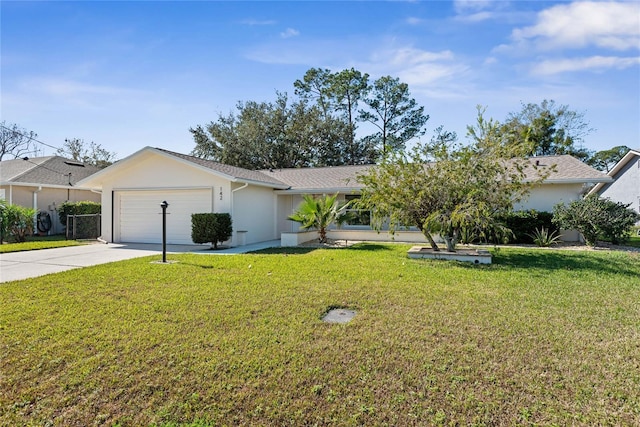 view of front of property with a front lawn and a garage