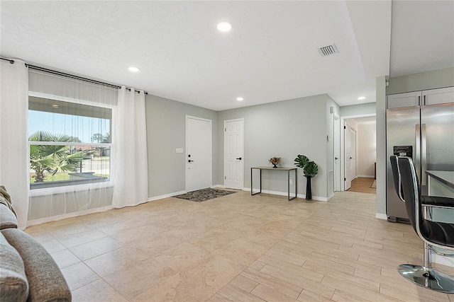 foyer entrance featuring light hardwood / wood-style flooring