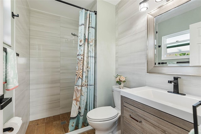 bathroom featuring toilet, decorative backsplash, vanity, tile walls, and a shower with shower curtain