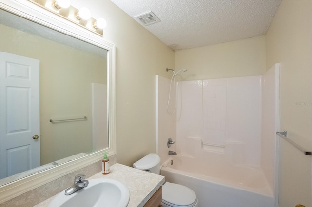 full bathroom featuring shower / bathtub combination, vanity, a textured ceiling, and toilet