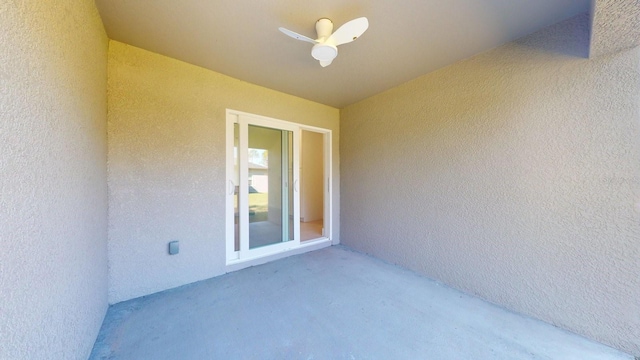 view of patio / terrace featuring ceiling fan