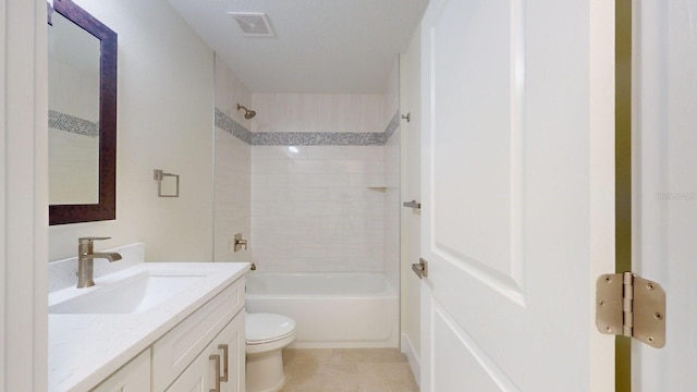 full bathroom with tile patterned floors, vanity, toilet, and tiled shower / bath