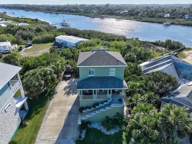 birds eye view of property featuring a water view