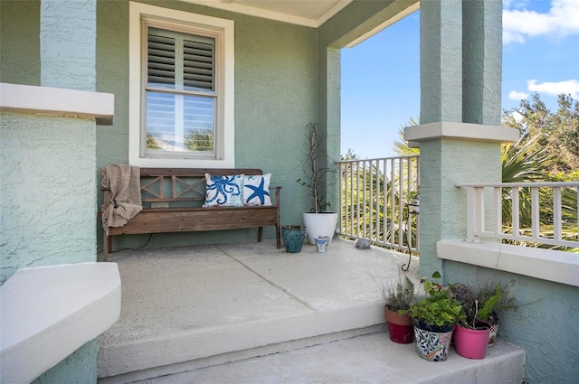 balcony featuring covered porch