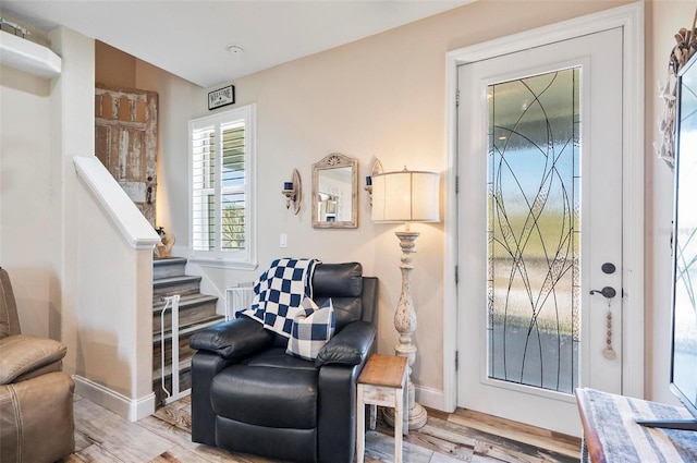 sitting room with light hardwood / wood-style floors