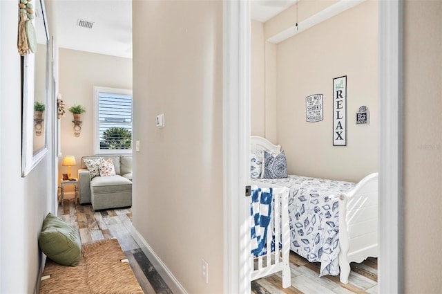 bedroom featuring light hardwood / wood-style floors