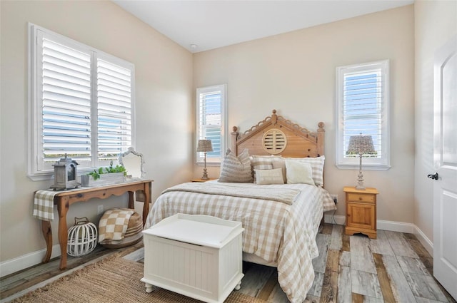 bedroom featuring hardwood / wood-style flooring