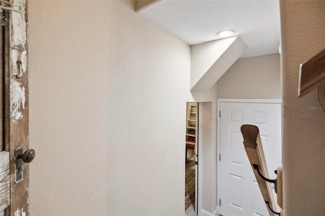 interior space featuring a textured ceiling