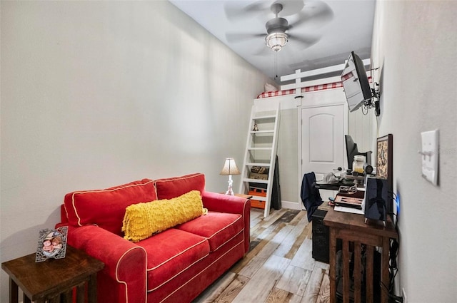 office featuring ceiling fan and light hardwood / wood-style floors