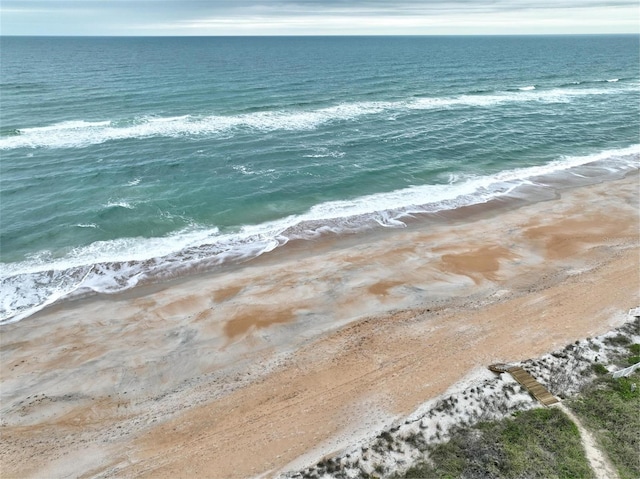 property view of water featuring a beach view