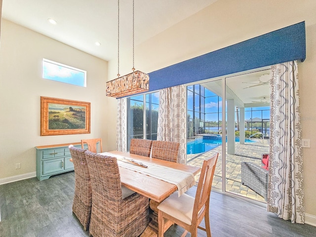 dining space with dark hardwood / wood-style flooring, plenty of natural light, and ceiling fan